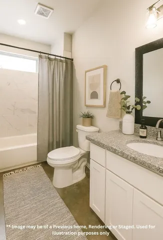 a bathroom with a granite countertop sink a toilet a mirror and shower