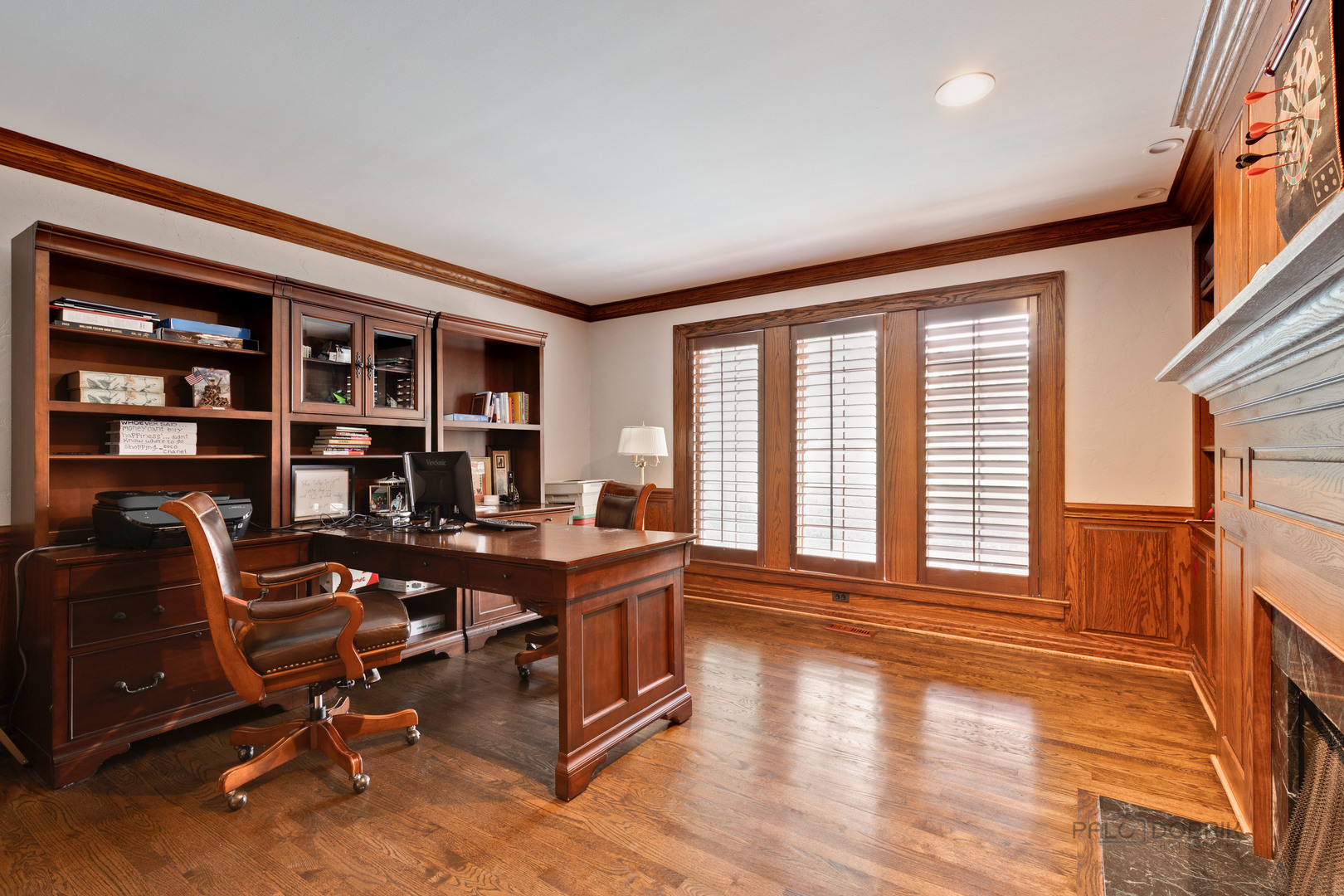 575 West Windsor Road Inverness, IL 60067 - Photo 17 of 54 a view of a workspace with furniture and a window