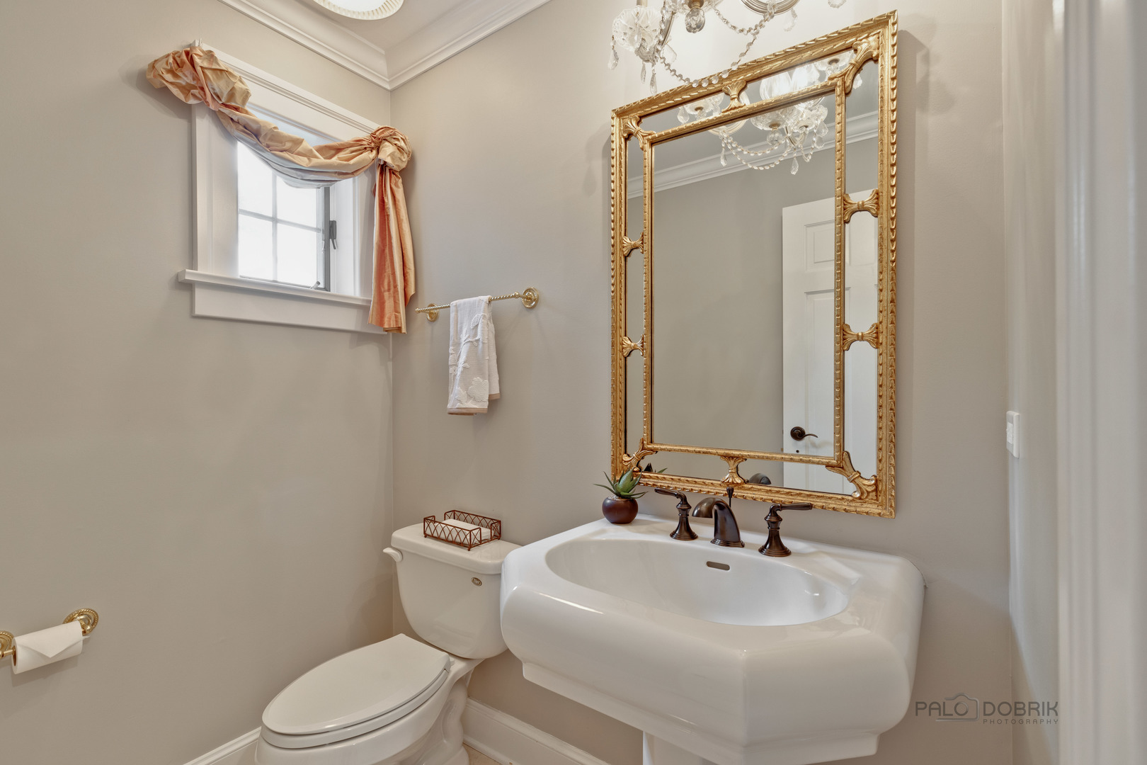 575 West Windsor Road Inverness, IL 60067 - Photo 19 of 54 a bathroom with a sink a mirror and a toilet