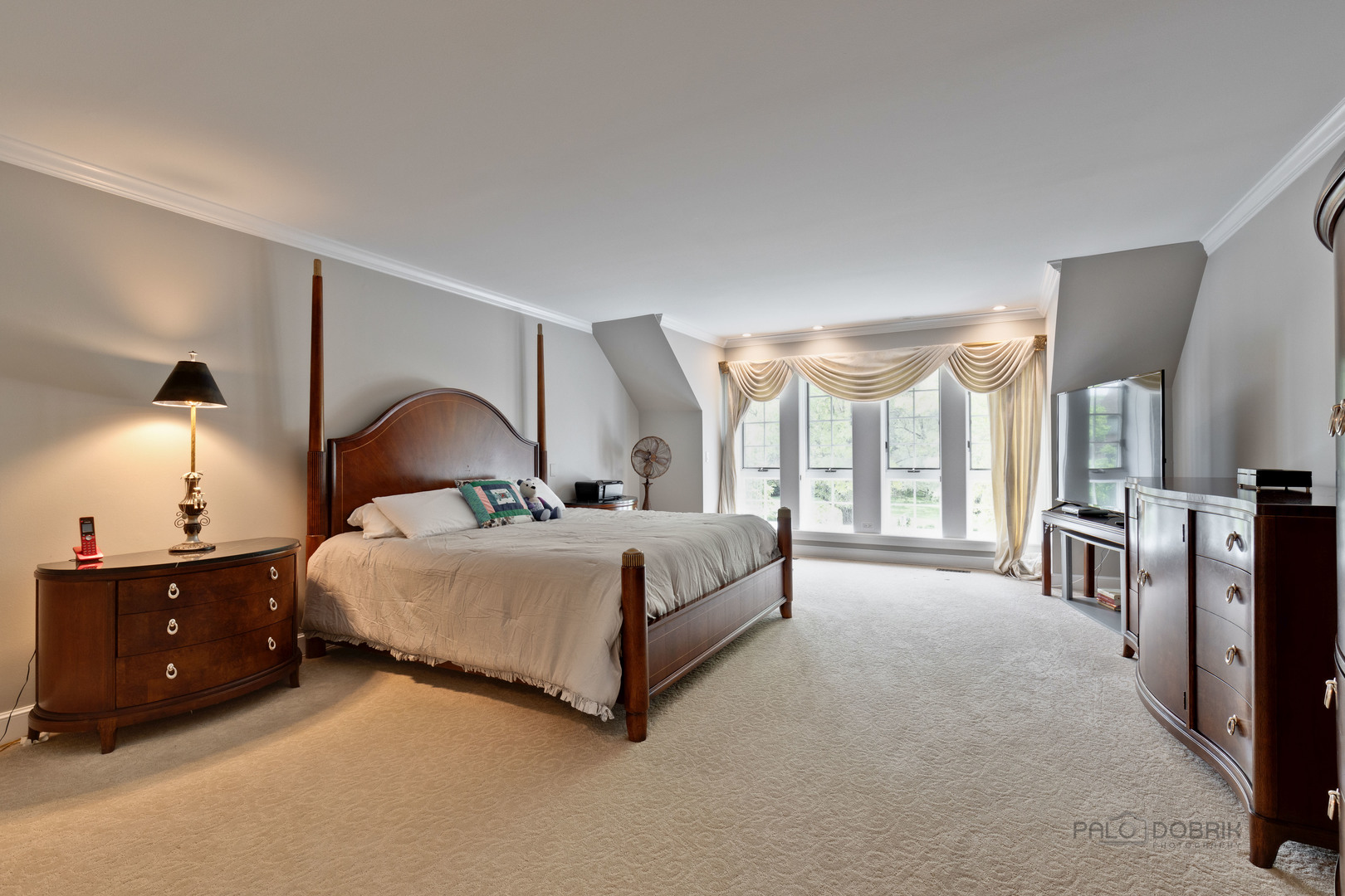 575 West Windsor Road Inverness, IL 60067 - Photo 24 of 54 a bedroom with a bed and a night stand
