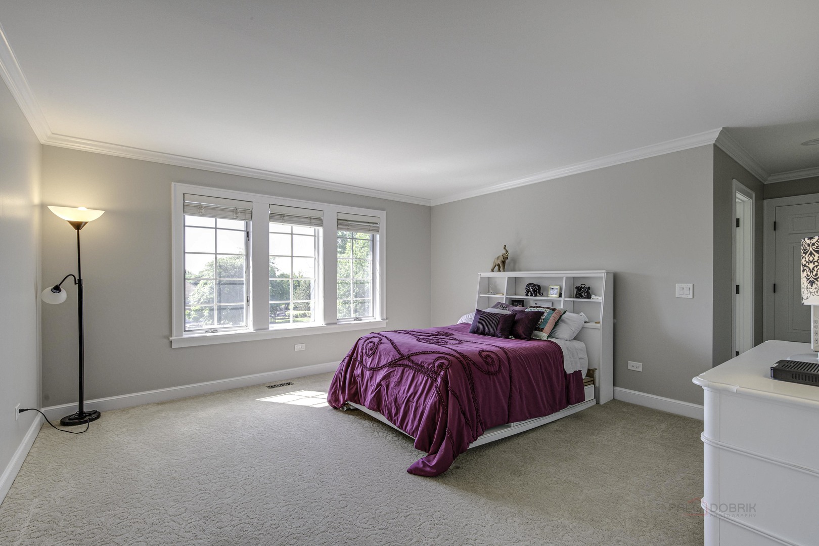 575 West Windsor Road Inverness, IL 60067 - Photo 30 of 54 a bedroom with a bed and a window