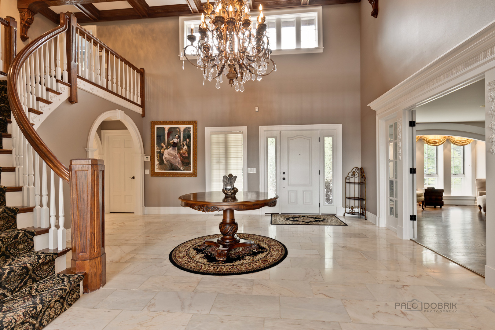 575 West Windsor Road Inverness, IL 60067 - Photo 3 of 54 a lobby with furniture and a chandelier