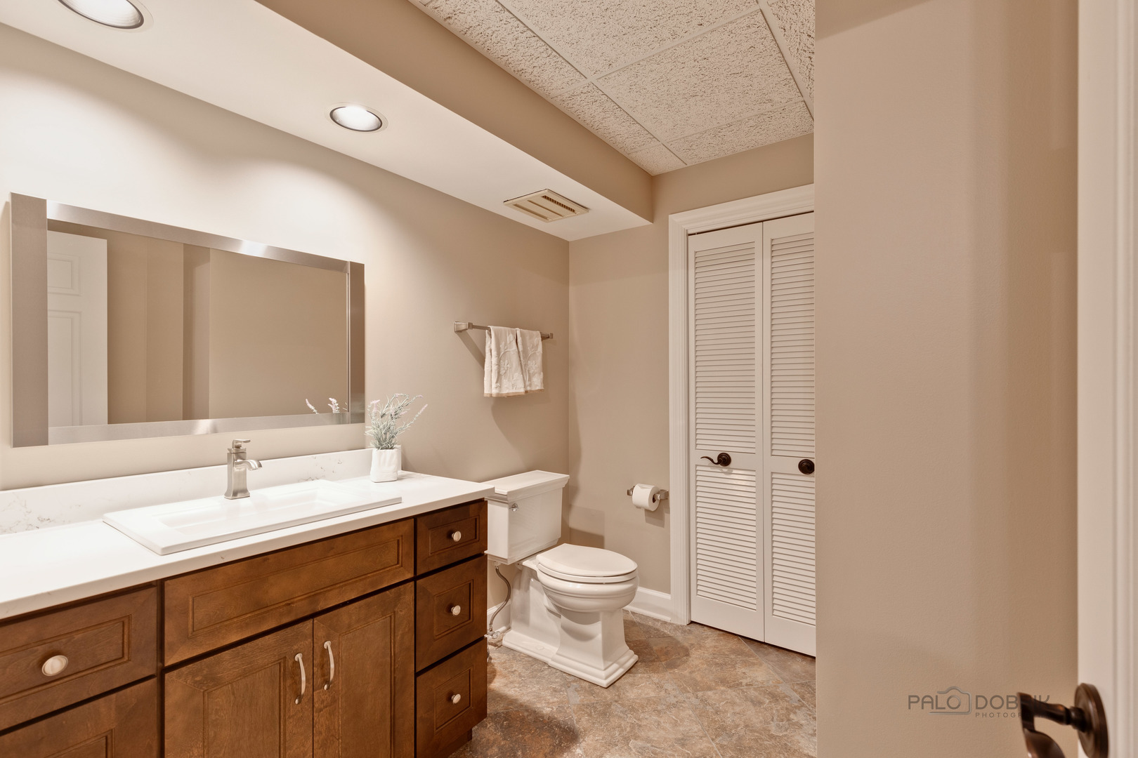 575 West Windsor Road Inverness, IL 60067 - Photo 40 of 54 a spacious bathroom with a toilet a sink a mirror and a shower