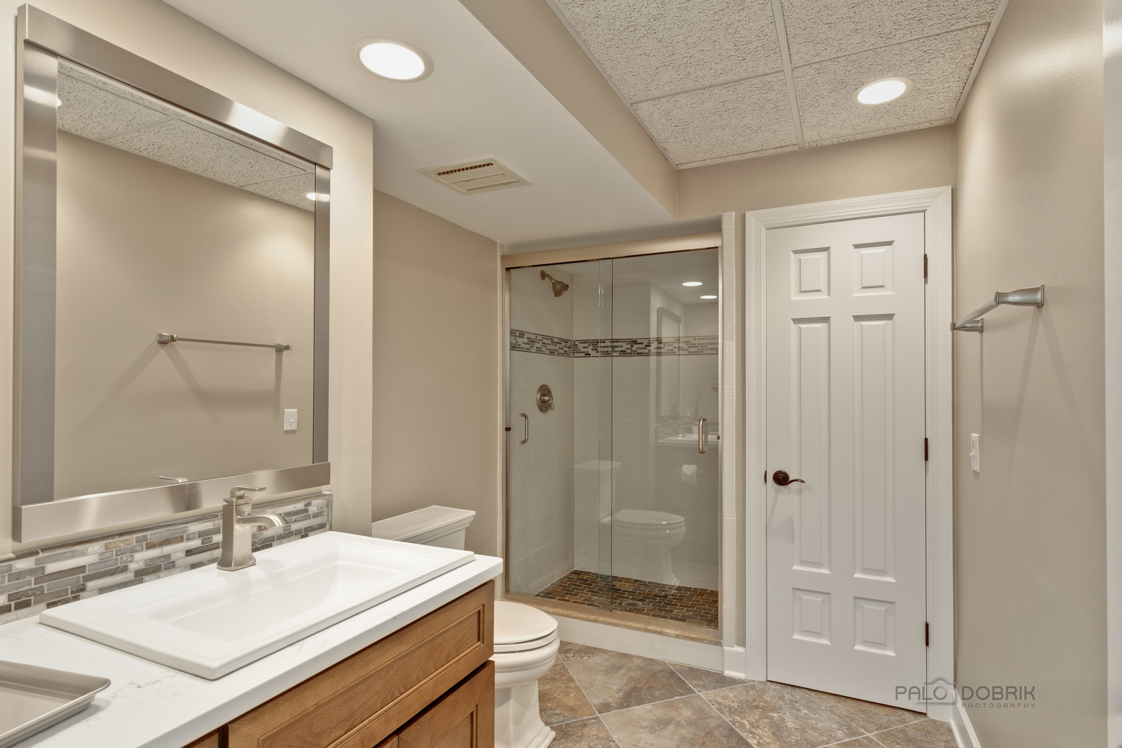 575 West Windsor Road Inverness, IL 60067 - Photo 46 of 54 a bathroom with a sink a toilet and shower