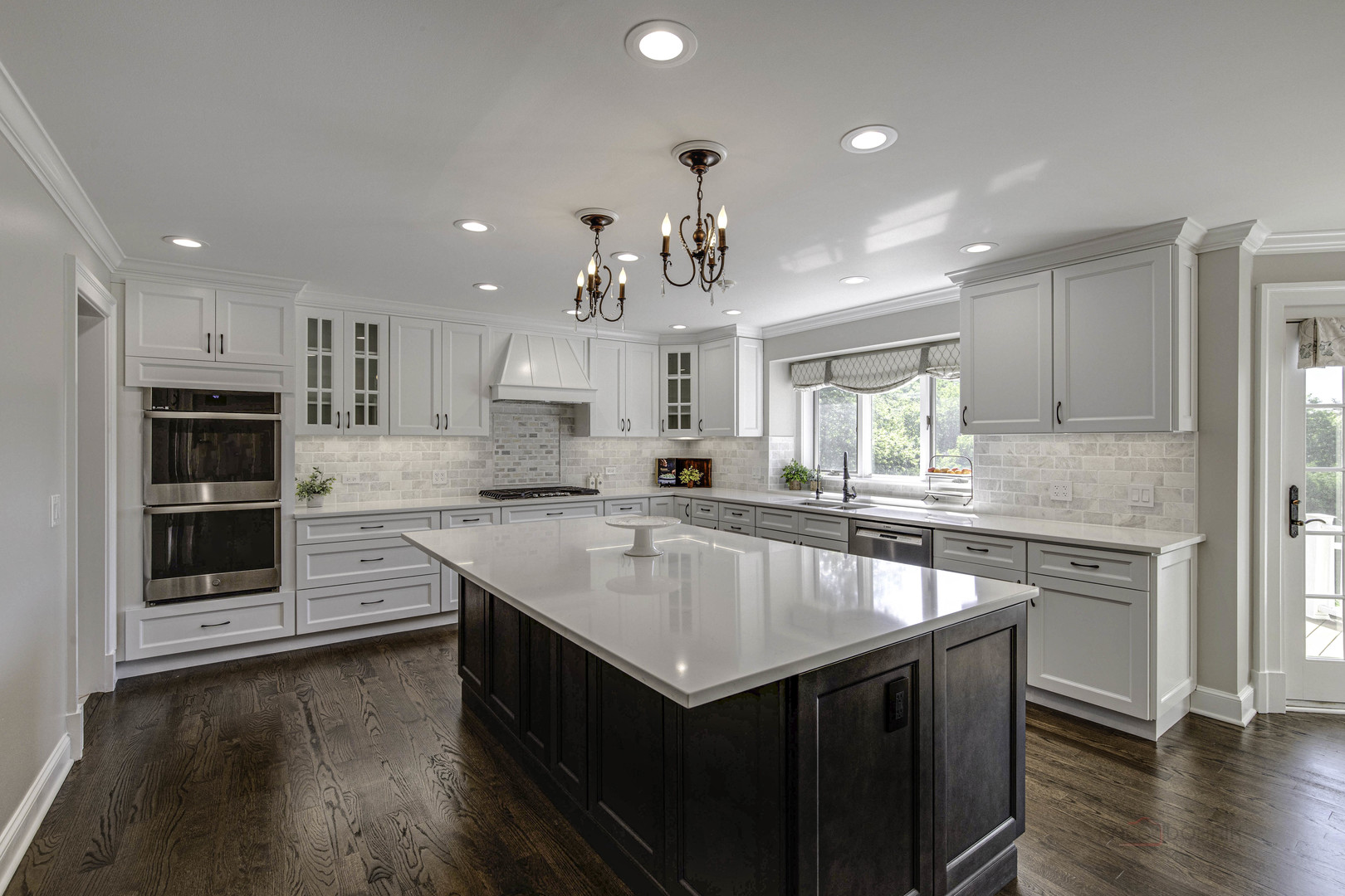 575 West Windsor Road Inverness, IL 60067 - Photo 6 of 54 a kitchen with a stove sink and cabinets