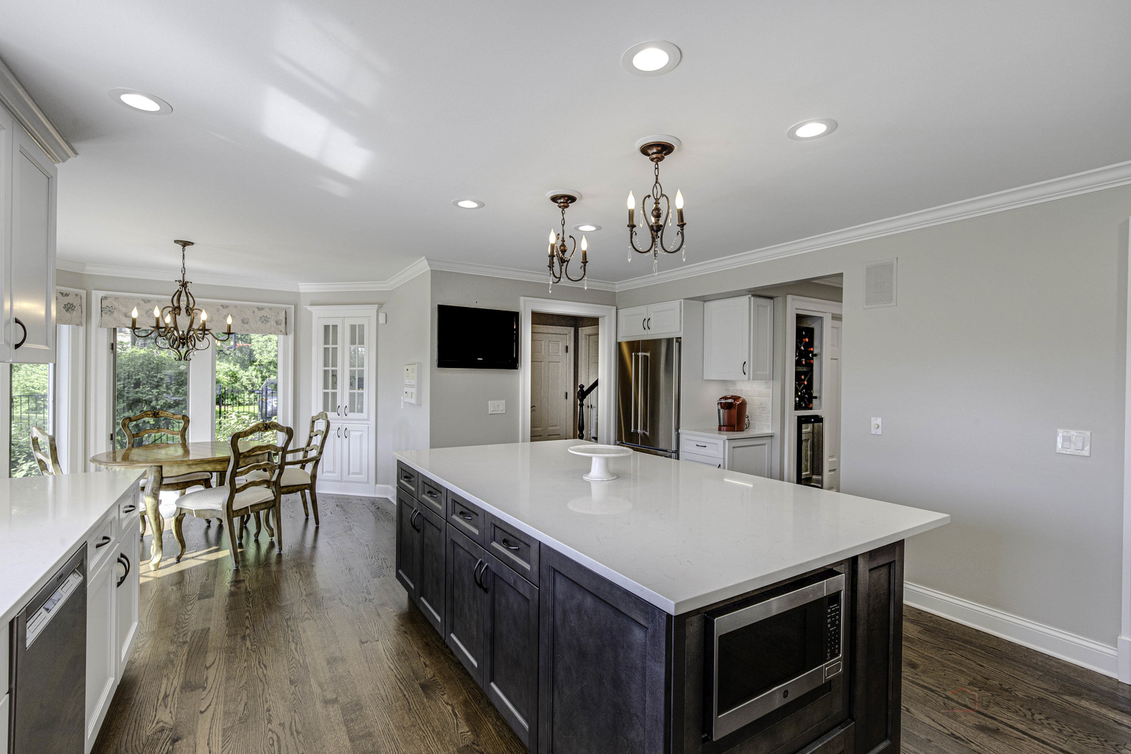 575 West Windsor Road Inverness, IL 60067 - Photo 8 of 54 a large kitchen with kitchen island a large island in the center