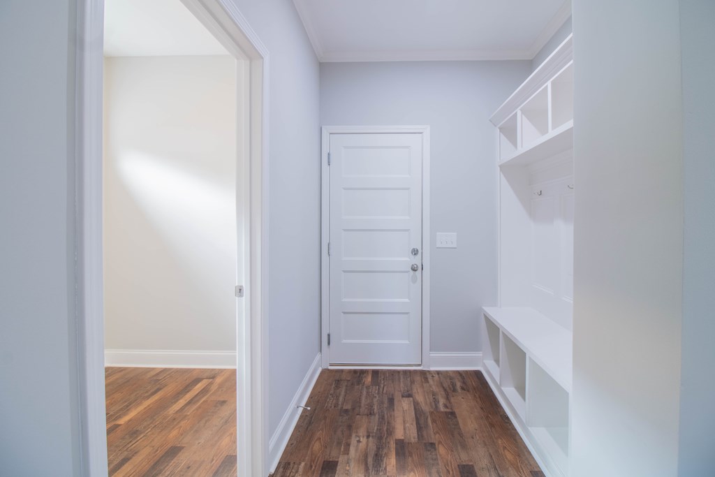 9605 Capot Drive Midland, GA 31820 - Photo 17 of 38 a view of hallway with closet and wooden floor