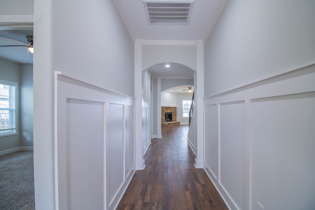9605 Capot Drive Midland, GA 31820 - Photo 2 of 38 a view of a hallway with wooden floor