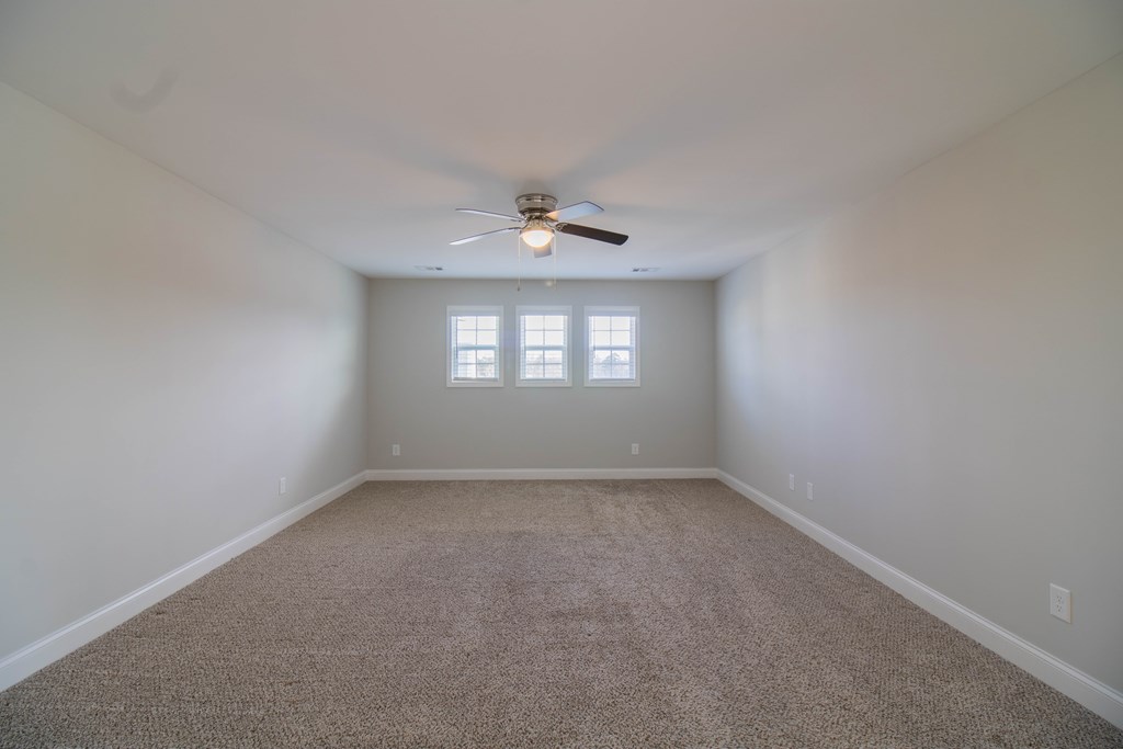 9605 Capot Drive Midland, GA 31820 - Photo 28 of 38 an empty room with a window