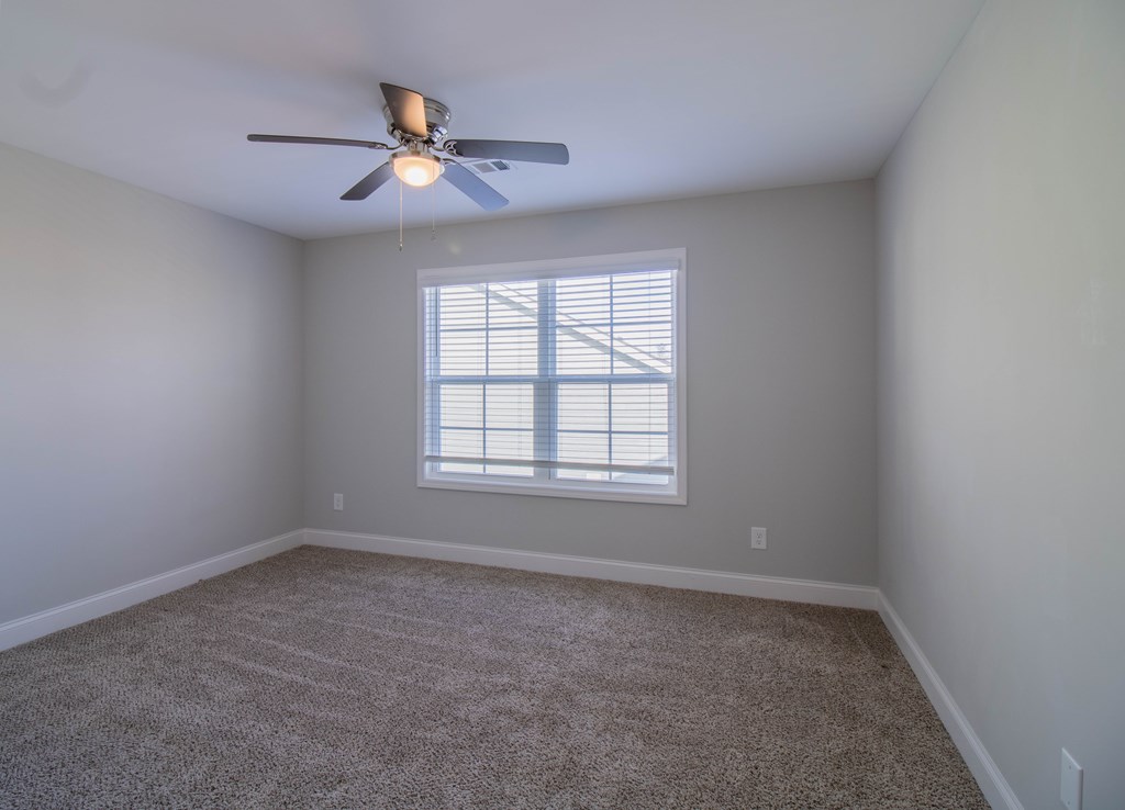 9605 Capot Drive Midland, GA 31820 - Photo 30 of 38 an empty room with a window