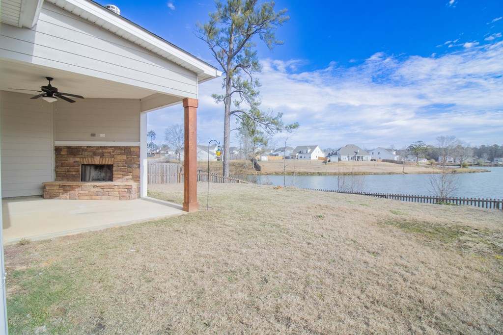 9605 Capot Drive Midland, GA 31820 - Photo 37 of 38 a view of swimming pool outdoor seating and yard in back