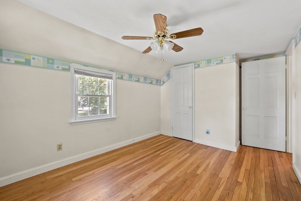 291 Maple Road Longmeadow, MA 01106 - Photo 17 of 26 wooden floor in an empty room with a window