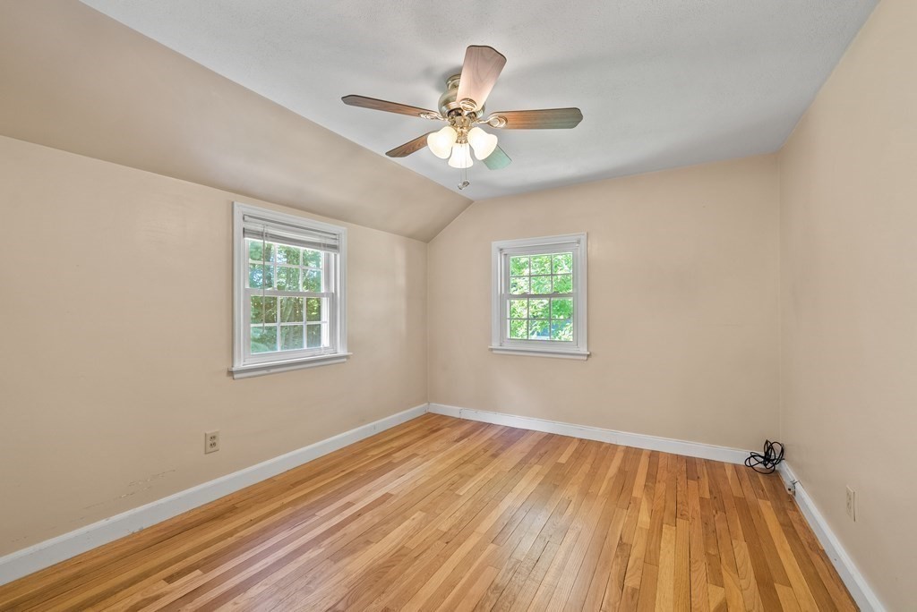 291 Maple Road Longmeadow, MA 01106 - Photo 18 of 26 wooden floor in an empty room with a window