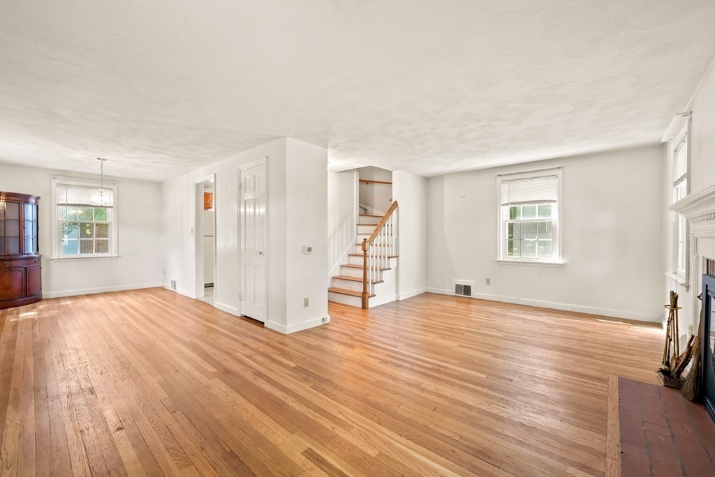 291 Maple Road Longmeadow, MA 01106 - Photo 7 of 26 a view of empty room with wooden floor and fan