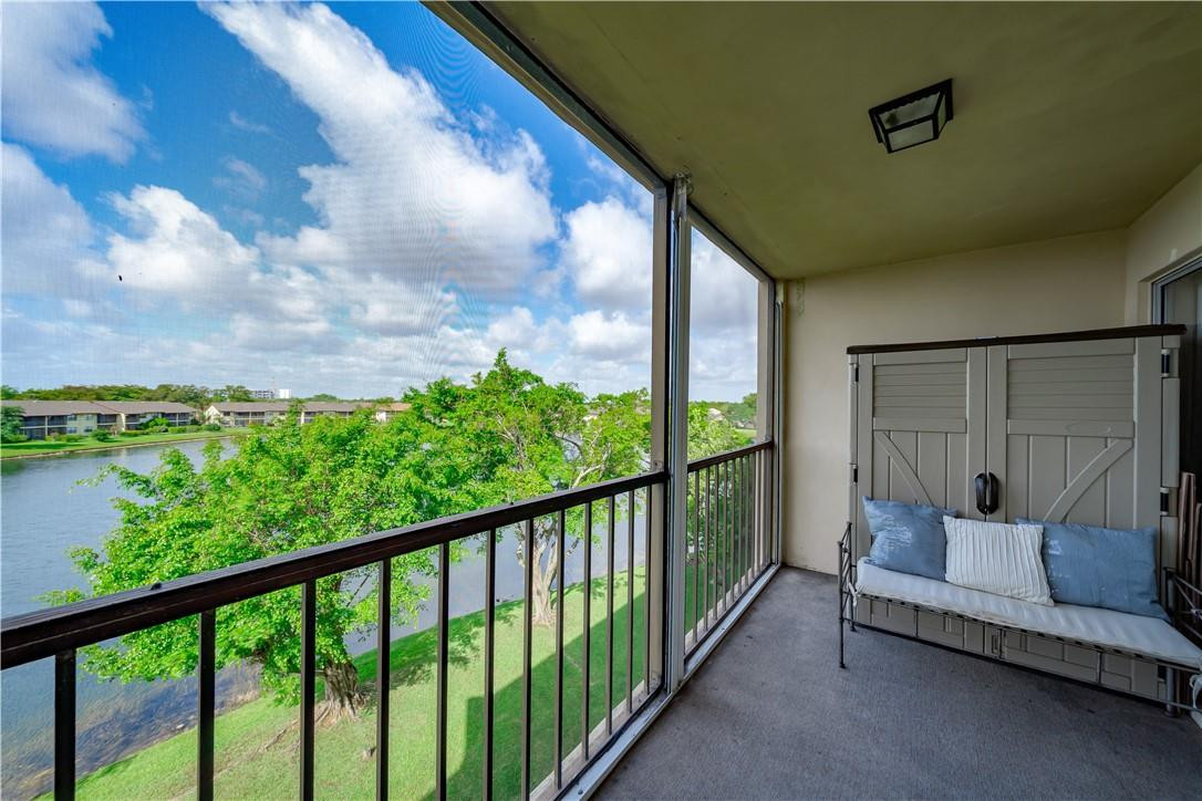 3955 North Nob Hill Road, Unit 408 Sunrise, FL 33351 - Photo 26 of 34 a balcony with outdoor views