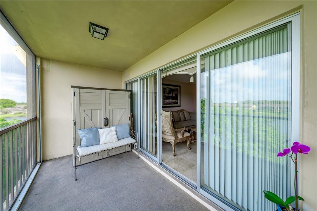 3955 North Nob Hill Road, Unit 408 Sunrise, FL 33351 - Photo 27 of 34 a living room with furniture