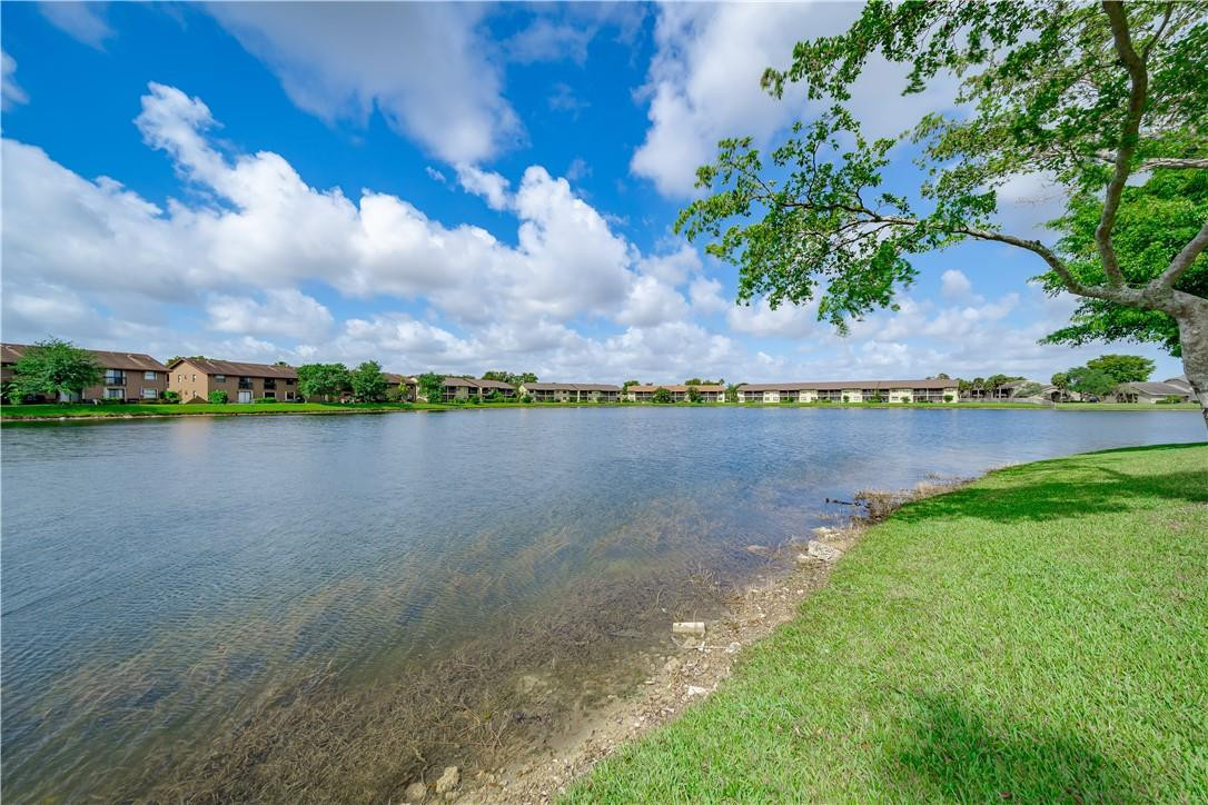 3955 North Nob Hill Road, Unit 408 Sunrise, FL 33351 - Photo 29 of 34 a view of a lake