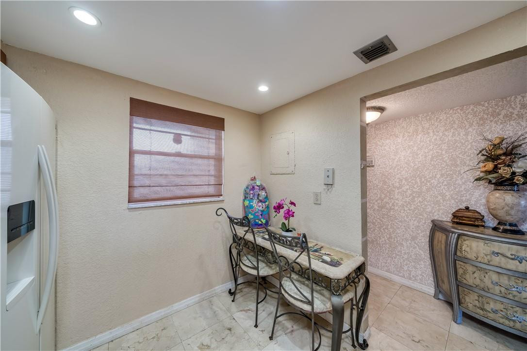 3955 North Nob Hill Road, Unit 408 Sunrise, FL 33351 - Photo 10 of 34 a view of a workspace with furniture