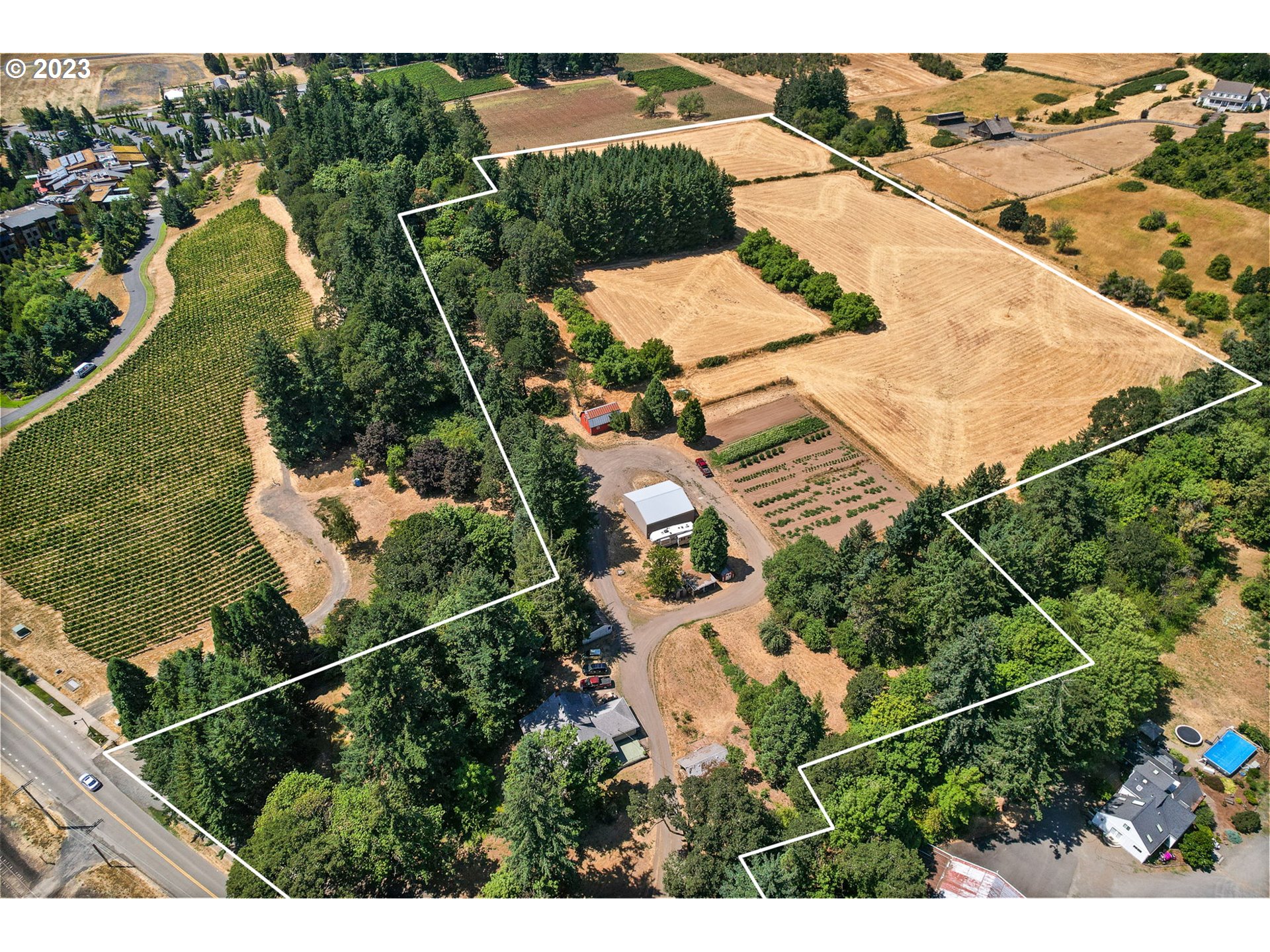 3809 North Springbrook Road Newberg, OR 97132 - Photo 4 of 14 an aerial view of a house with a yard