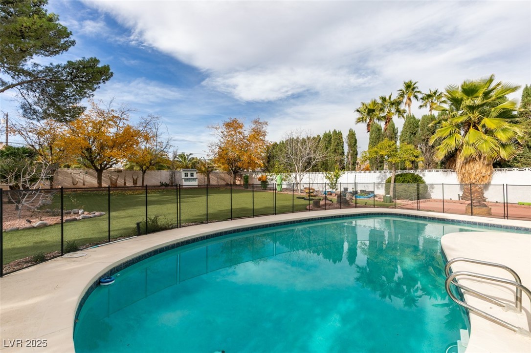 2875 Rosanna Street Las Vegas, NV 89117 - Photo 51 of 54 POOL WITH A FULL FENCE
