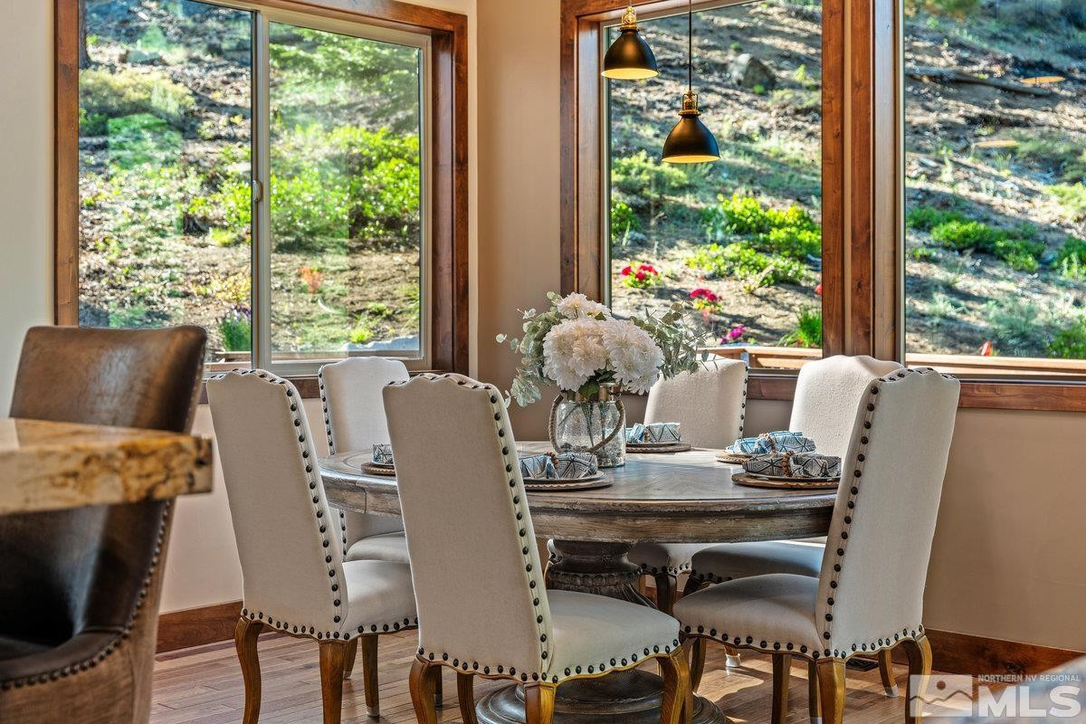 2204 Lands End Road Glenbrook, NV 89413 - Photo 11 of 40 a view of a dining room with furniture window and outside view