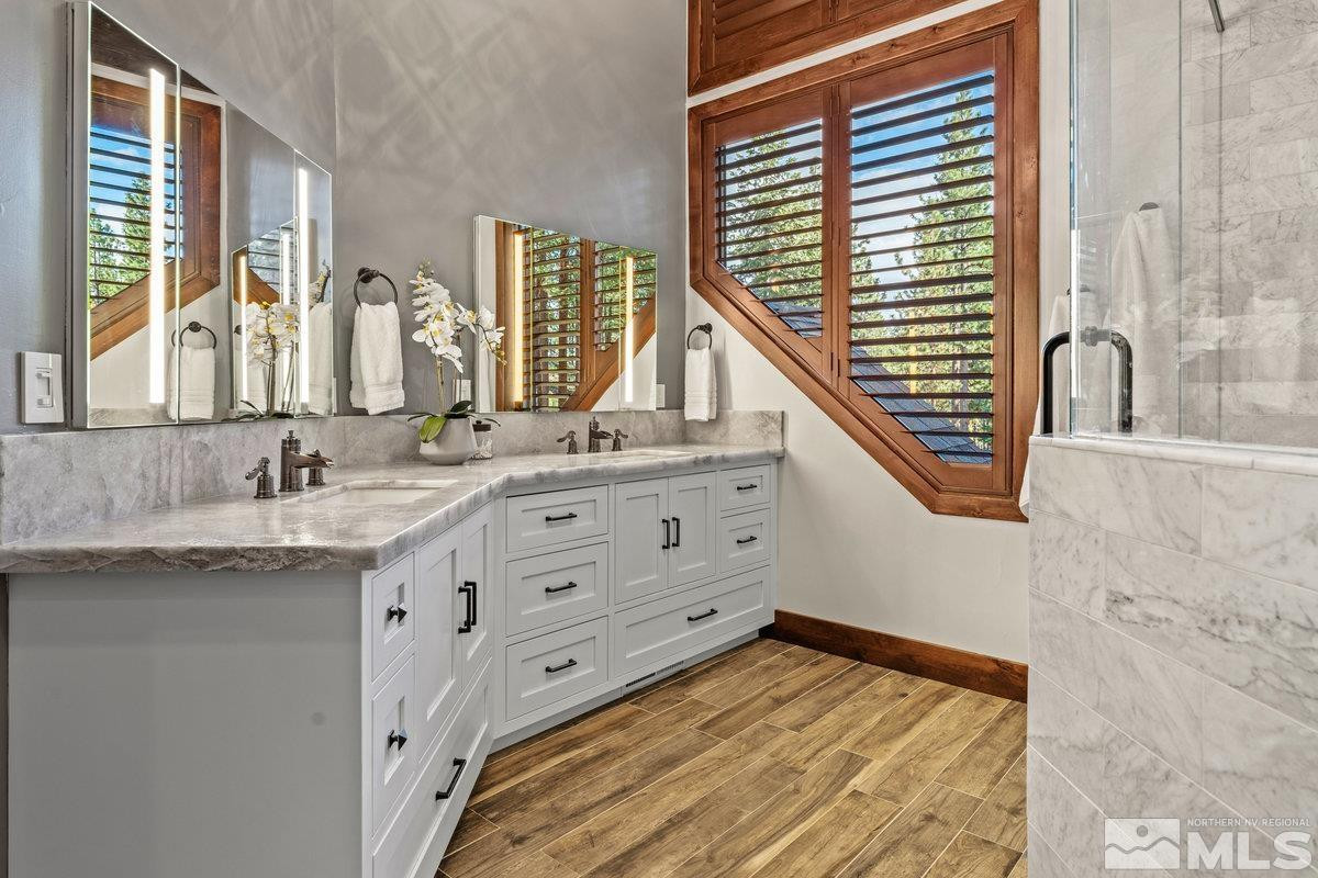2204 Lands End Road Glenbrook, NV 89413 - Photo 13 of 40 a bathroom with a sink and a mirror