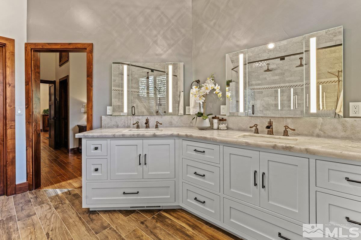 2204 Lands End Road Glenbrook, NV 89413 - Photo 14 of 40 a bathroom with a sink vanity and mirror