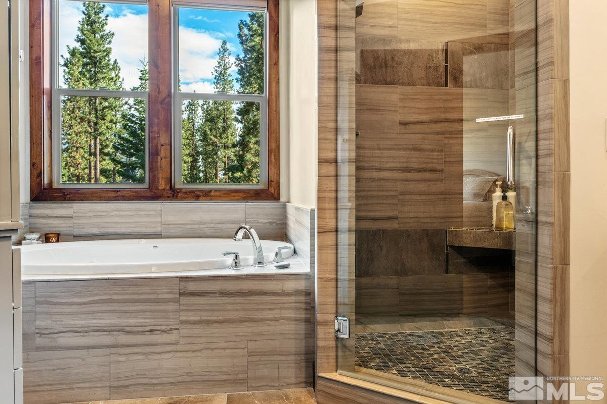 2204 Lands End Road Glenbrook, NV 89413 - Photo 18 of 40 a bathroom with a bathtub and shower