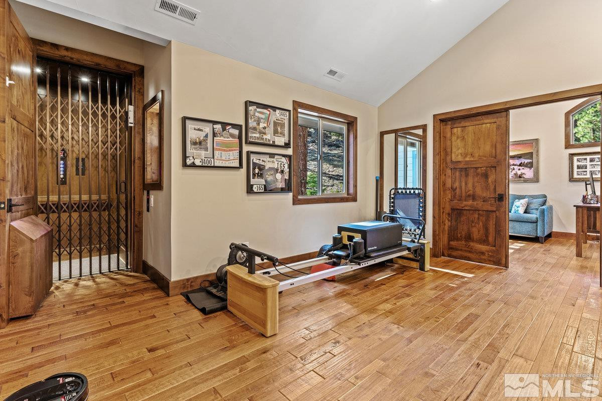 2204 Lands End Road Glenbrook, NV 89413 - Photo 19 of 40 a living room with furniture window and a wooden floor