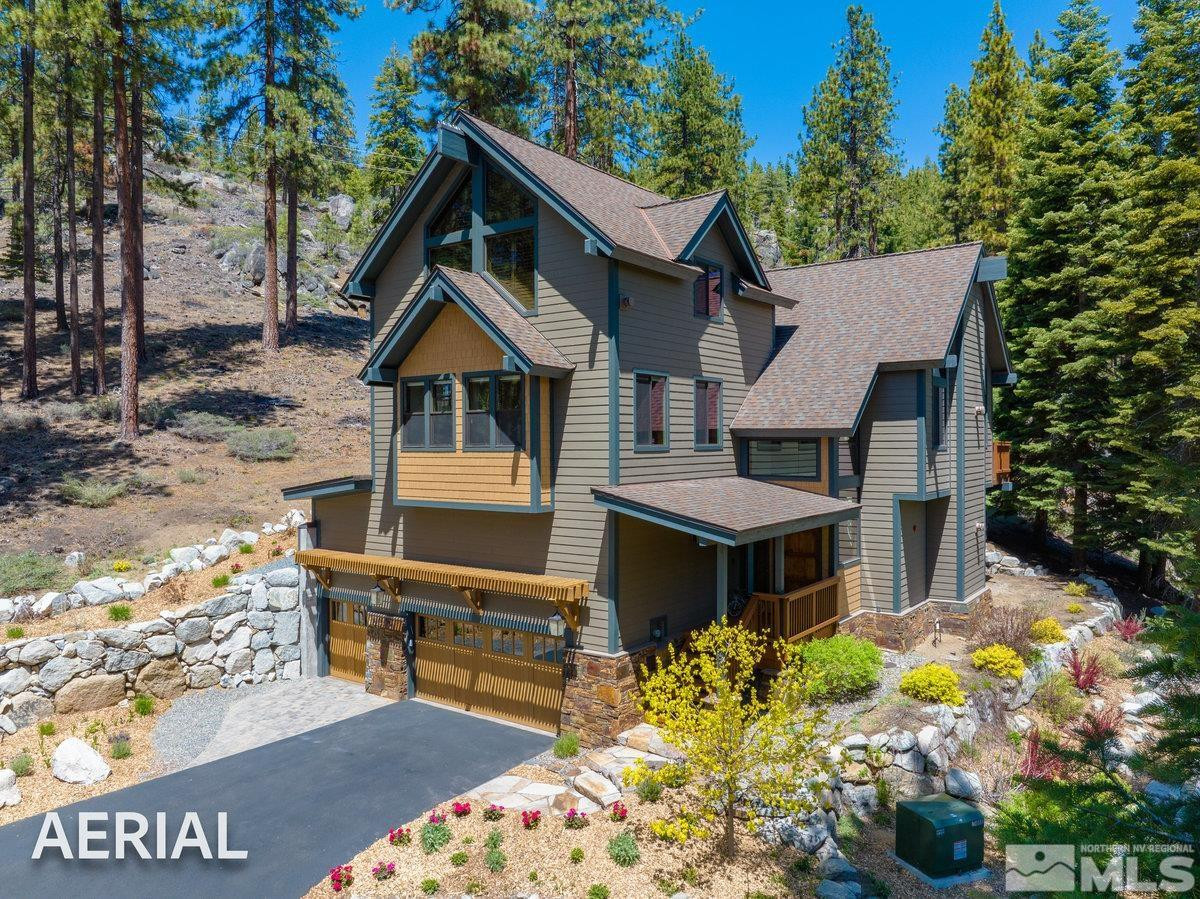 2204 Lands End Road Glenbrook, NV 89413 - Photo 2 of 40 a front view of a house with a yard