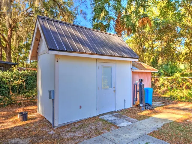 a house view with a backyard space