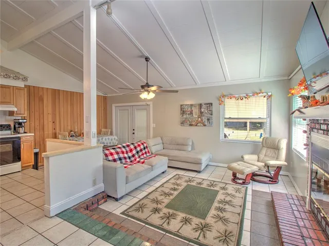 a living room with furniture and a rug