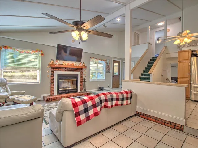 a bedroom with a bed and a fireplace