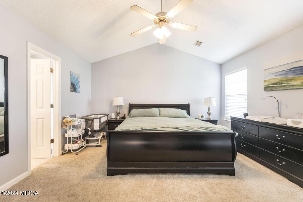 307 Timberwind Drive Byron, GA 31008 - Photo 20 of 27 a bedroom with a bed and window