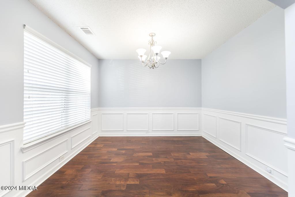 307 Timberwind Drive Byron, GA 31008 - Photo 8 of 27 a view of an empty room with a window