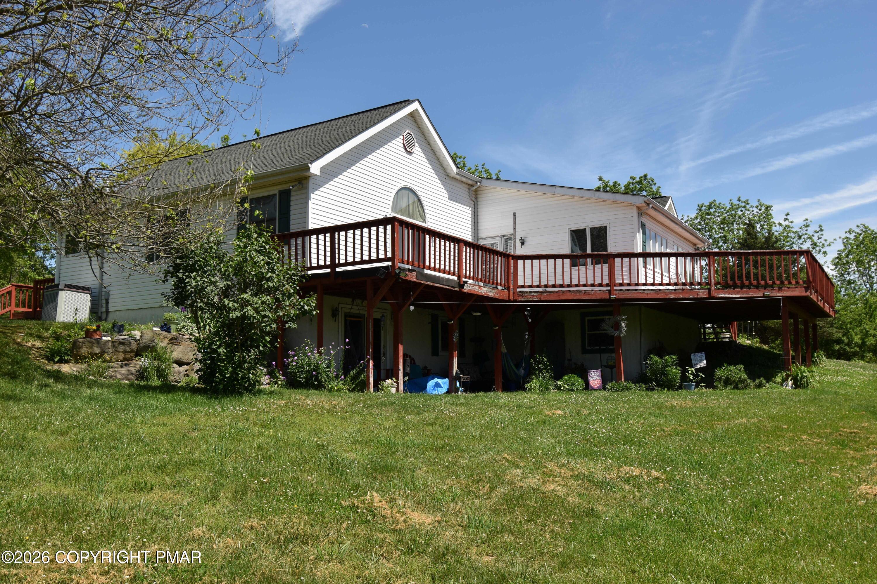 160 Quiet Valley Road Mount Bethel, PA 18343 - Photo 44 of 44 a front view of a house with garden