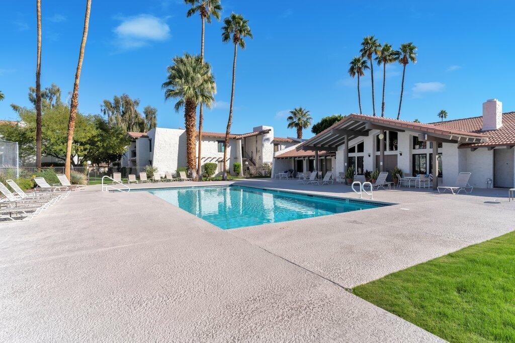 1050 Ramon Road, Unit 3 Palm Springs, CA 92264 - Photo 25 of 28 a view of a house with a yard