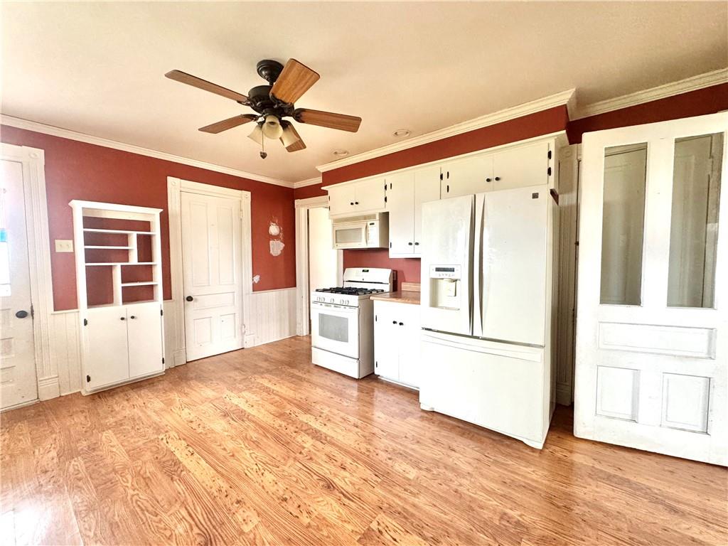 3282 Hann Hill Road Hermitage, PA 16148 - Photo 15 of 41 a view of a kitchen with wooden floor and a kitchen space