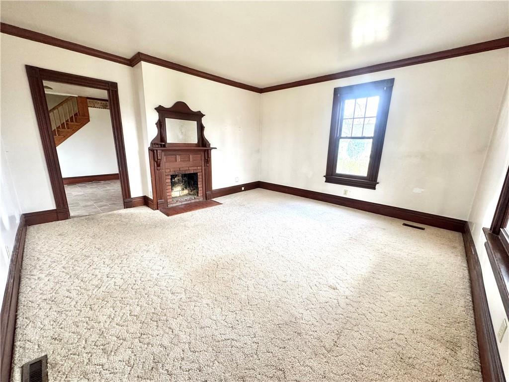 3282 Hann Hill Road Hermitage, PA 16148 - Photo 20 of 41 a view of a livingroom with wooden floor and a fireplace