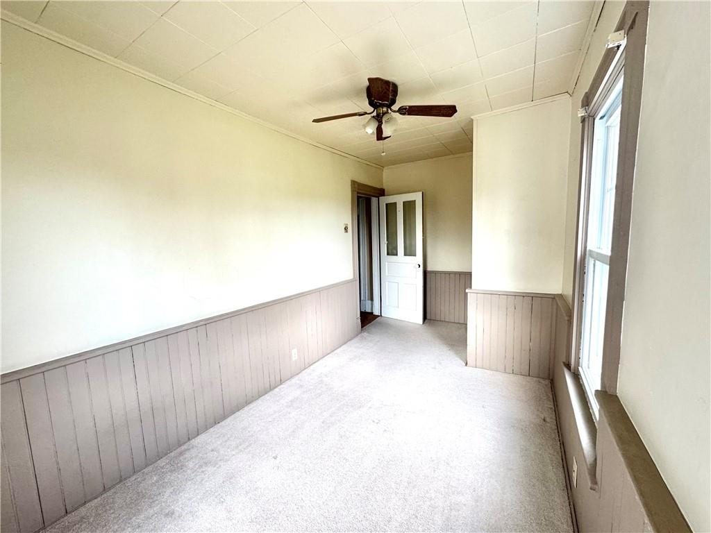 3282 Hann Hill Road Hermitage, PA 16148 - Photo 30 of 41 a view of a hallway with a chandelier fan and windows