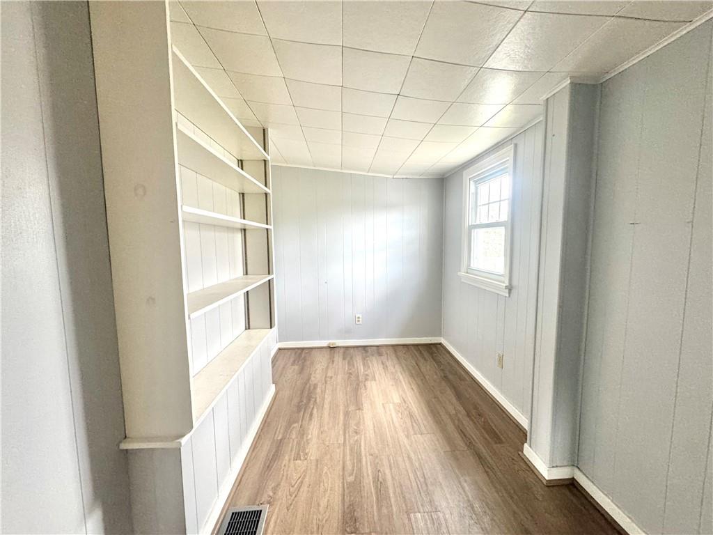 3282 Hann Hill Road Hermitage, PA 16148 - Photo 32 of 41 a view of empty room with wooden floor and fan