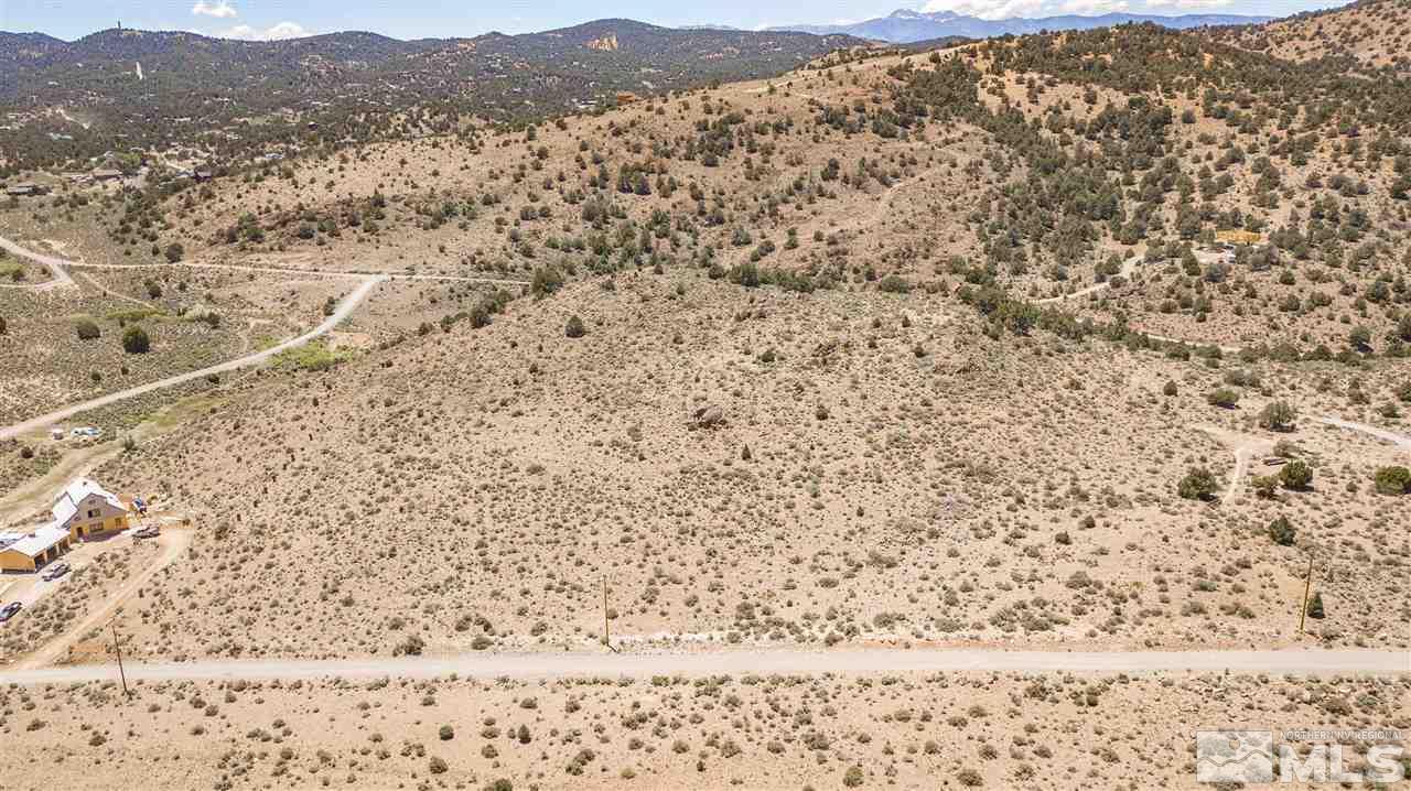 2880 Lousetown Road, Unit 38 Reno, NV 89521 - Photo 5 of 19 a view of a dry yard with mountains and green space
