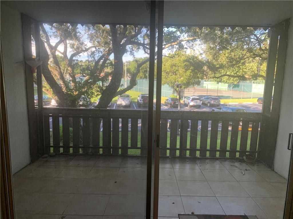 3710 Inverrary Drive, Unit 2U Lauderhill, FL 33319 - Photo 15 of 17 a view of backyard with green space