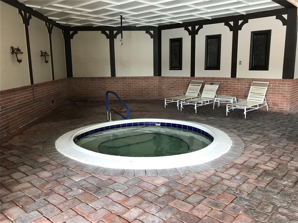 3710 Inverrary Drive, Unit 2U Lauderhill, FL 33319 - Photo 6 of 17 a view of table and chair in wooden floor