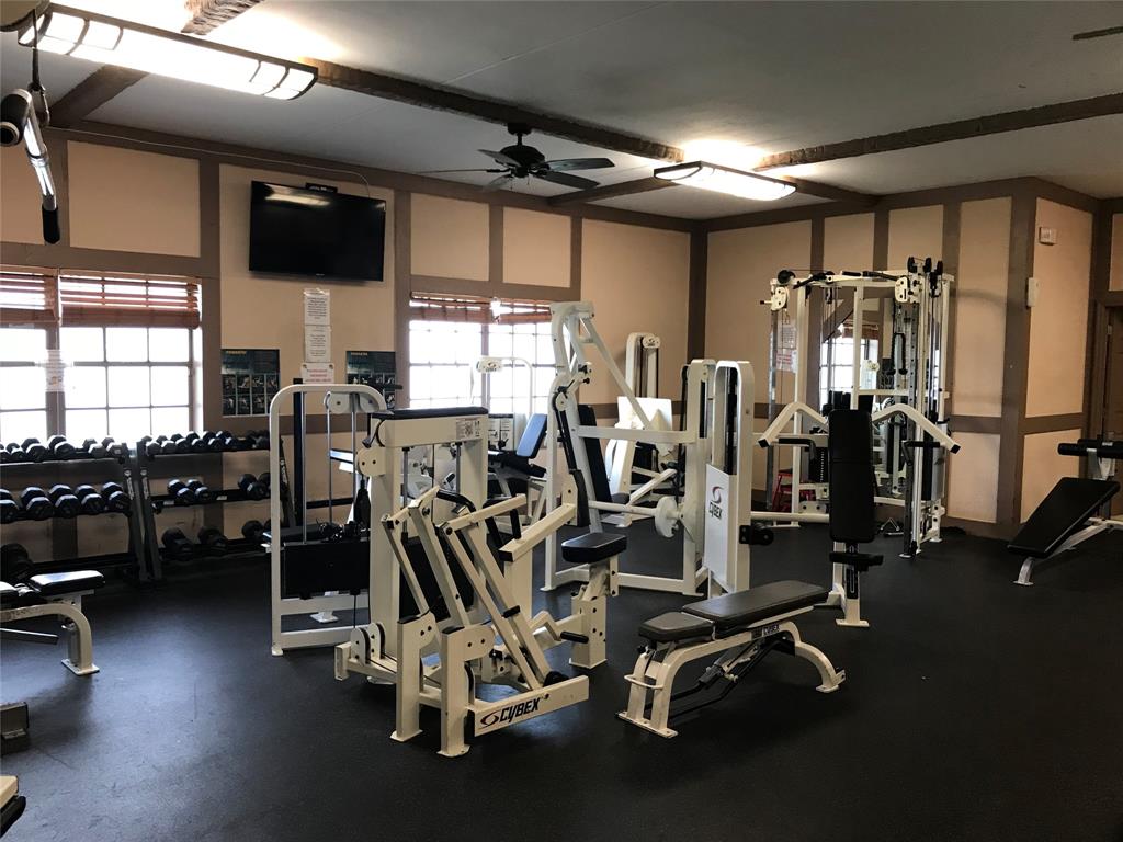 3710 Inverrary Drive, Unit 2U Lauderhill, FL 33319 - Photo 7 of 17 a view of a room with gym equipment