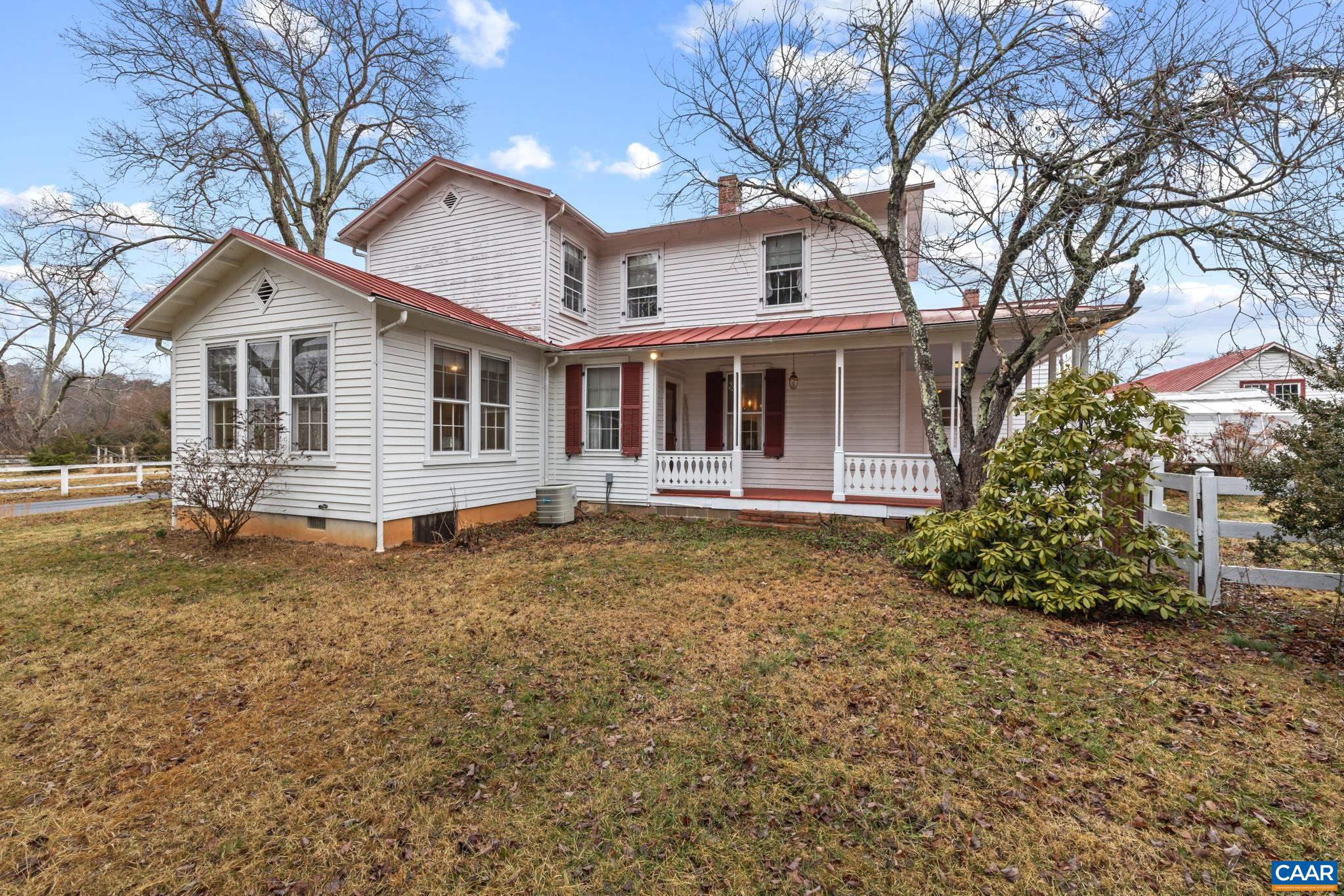 9451 Black Walnut Run Road Rhoadesville, VA 22542 - Photo 7 of 72 a front view of a house with a yard