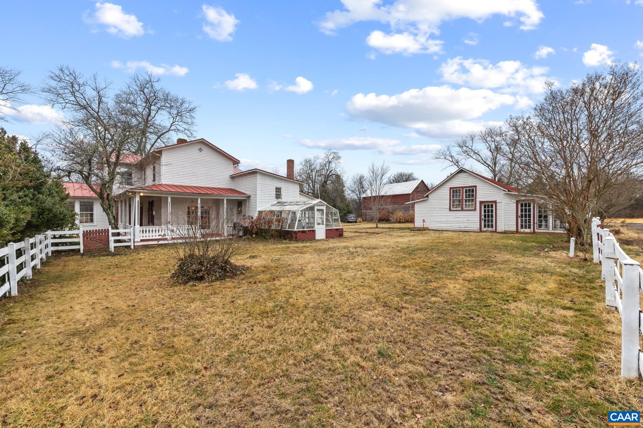 9451 Black Walnut Run Road Rhoadesville, VA 22542 - Photo 9 of 72 a front view of a house with a yard