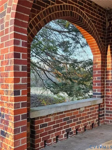 a view of a living room and bathroom