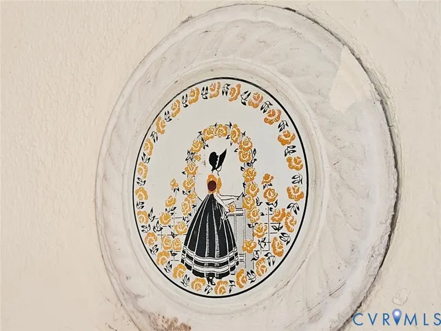 an empty room with closet and wooden floor