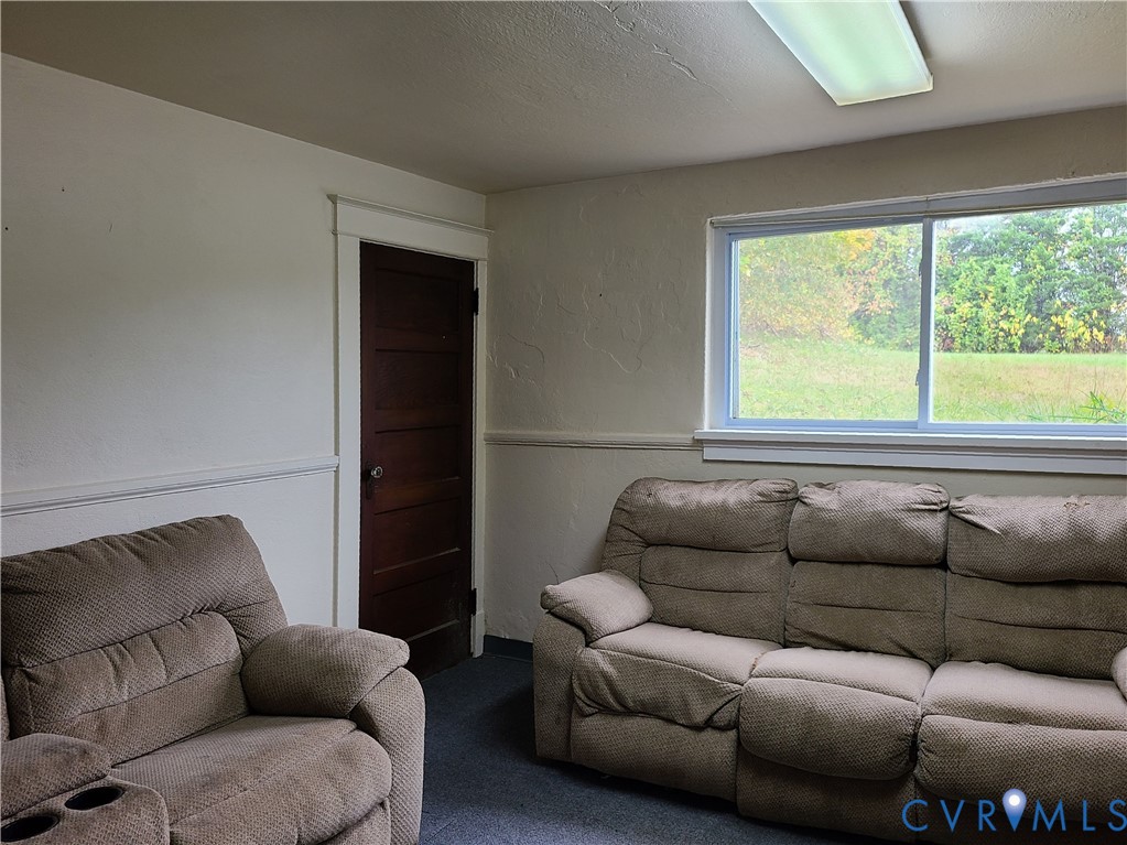 16124 Beaverdam School Road Beaverdam, VA 23015 - Photo 40 of 50 a living room with furniture and a window